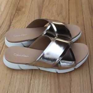 Calvin Klein gold slides. Size 8.